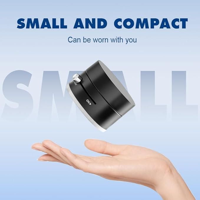 Close-up of on/off control switch on vacuum magnetic mobile holder with sleek black finish