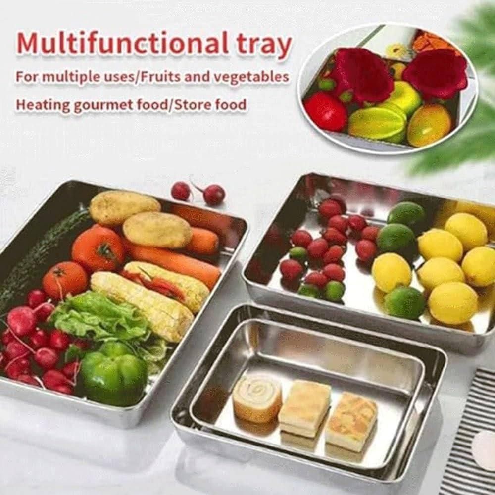 Oven-safe non-stick silver baking trays with corn, fish, and seafood displayed